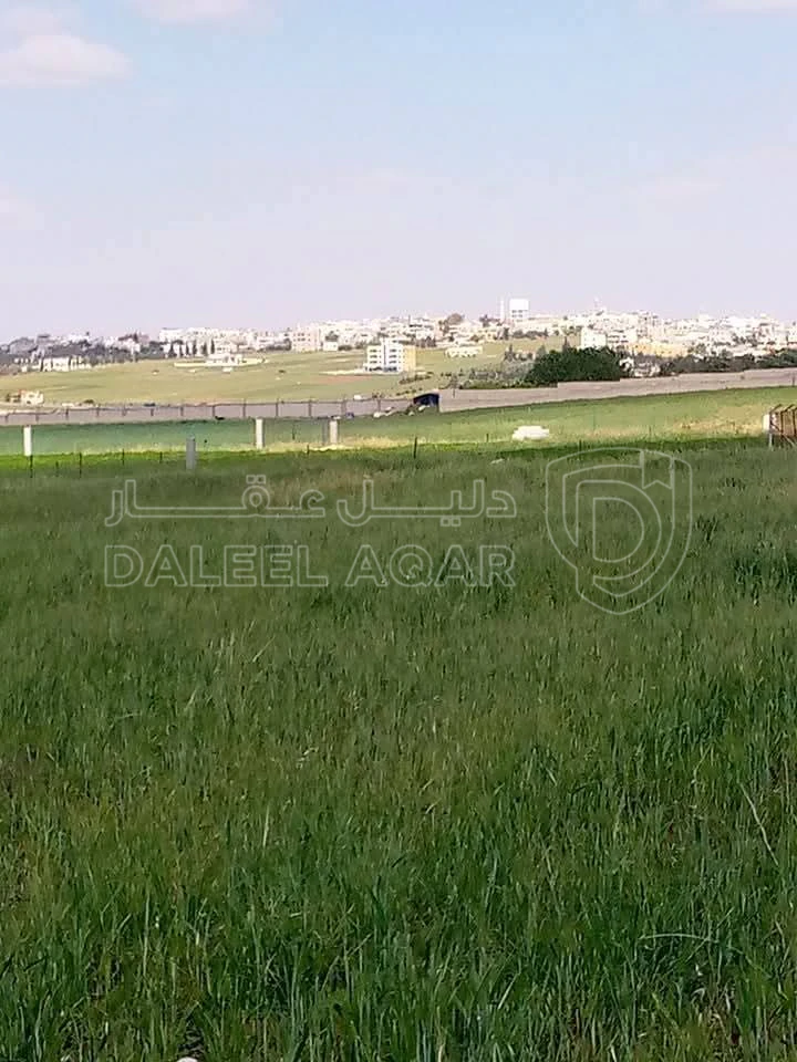 أرض في غرب منطقة النديم والحراويه غرب دوار الطياره  2 كم  - 120,000 دأ - صورة 1