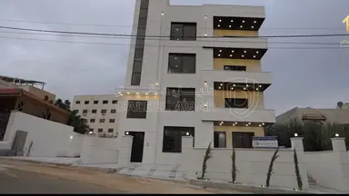 شقة في ‏ALHAKAM HOUSING كاش او أقساط من المالكمشروع مادبا حي الرشاد ((بالقرب من مسجد عيسى أبن مريم))( شقق طابقيه مساحة (174)📌لدينا فريق كامل مجهز في اي وقت للجولات الميدانية وتزويدكم في ادق التفاصيل للمشروع (المشروع جاهزة للتسليم) 🏘️🏘️🏙️ شركتنا مختصة باختيار المواقع الاستراتيجية وفي أرقى المناطق) ________🏘️ مواصفات الشقق بمواصفات ڤلل💯تشطيبات سوبر ديلوكس❇️ مساحة الشقه الاولى 174+220 مساحات خارجيه ❇️ مساحة الشقق (174)م وتتكون من : ✔️ 2 غرف نوم اطفال  ✔️ غرفة ماستر ✔️ 3حمامات ✔️ صالون مع بلكونه✔️ مطبخ مع بلكونه✔️ غرفة ضيوف مع بلكونه 📌مواصفـات الشقة :-🔹المنيوم مقطع خاص Spacer 16m زجاج Double Glaze عازل للحرارة والصوت .🔹اباجورات المنيوم كهرباء معزولة Foam .🔹 بورسلان إسباني نخب أول .🔹 أطقم حمامات معلقة Vetra .🔹 مغاسل كاونتر مع خزائن Laminate .🔹 بطاريات Roca إسباني .🔹 نظام Shower Jet مع قاطع سيكوريت واكسسوارات Stainless steel .🔹 أسقف جبسبمورد مع ديكورات مودرن مميزة لكامل الشقة .🔹انارة Spot light Linear light لكامل الشقة .🔹أبواب قشرة جوز دهان ايطالي .🔹باب رئيسي أمان متعدد الاقفال .🔹دهانات ديكورية للمداخل ودهانات Dulux لداخل الشقة .🔹انتركم  .🔹تمديدات انترنت لكل الغرف .🔹تأسيس كامل للمكيفات لكل الغرف ويشمل النحاس والكهرباء والتصريف .🔹نظام ستلايت مركزي📌مواصفات المشروع :-🔸واجهات وبروزات معمارية مميزة حجر رويشد نخب اول قياس 50 سم .🔸ديكورات للمداخل والادراج وواجهات المصاعد .🔸رخام ايطالي للمداخل والادراج والترسات .🔸مصعد ايطالي Stainless Steel .🔸عزل كامل مائي وحراري لجدران المبنى داخلي وخارجي .🔸موقف سيارة مستقل لكل شقة .🔸خزان ماء اضافي لكل شقة .🔸تشطيبات Super Deluxe .🔸اشراف هندسي كامل على كافة مراحل العمل من التأسيس وحتى التشطيب النهائي .✅ خدمة ضمان ما بعد البيع :-جميع الشقق منفذة باعلى المواصفات الفنية ومكفولة لمدة سنةكاملة 💯.للأستفسار :0777979428 - 75,000 دأ - صورة NaN