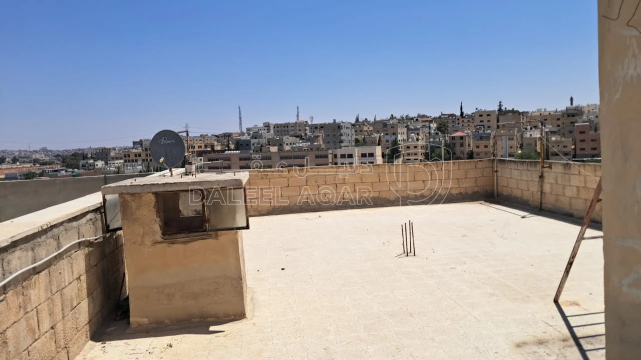مبنى في الرصيفة - تطوير النقب - قريب اتستراد عمان الزرقاء - 55,000 دأ - صورة 1