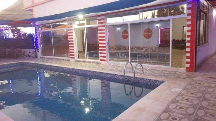 مبنى في مزرعة وشاليه للبيع في بلعما الزيتونه مساحة 3.459 - 85,000 دأ - صورة 1