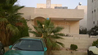 مبنى في تلاع العلي  فوق صالة البنفسج جانب خزان الماء - 300,000 دأ - صورة NaN