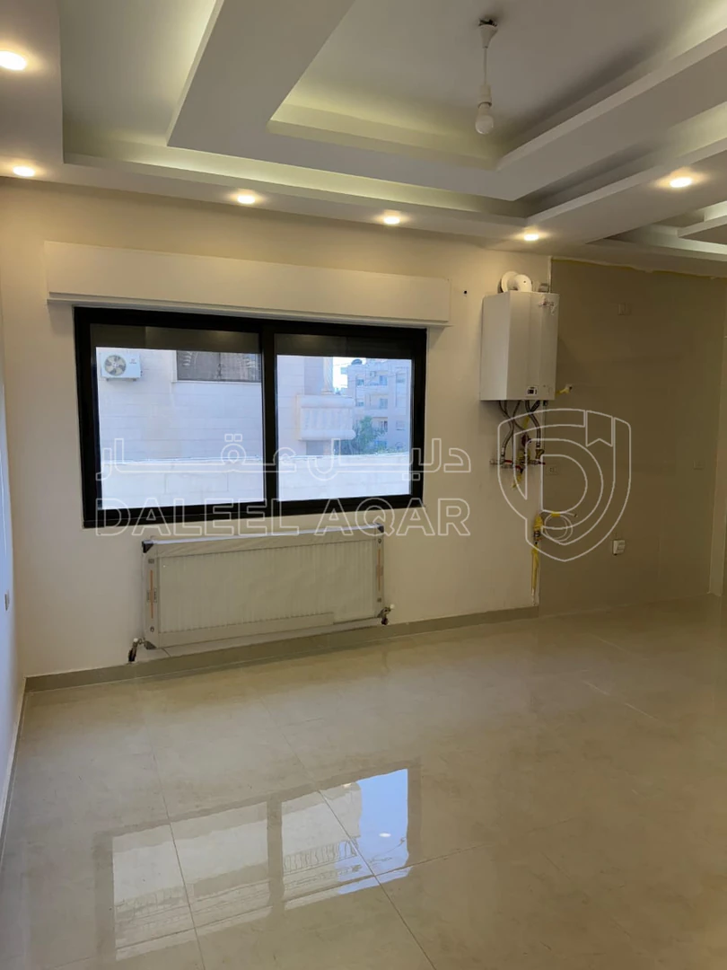 شقة في خلف الجامعة الاردنية  - 64,000 دأ - صورة 1