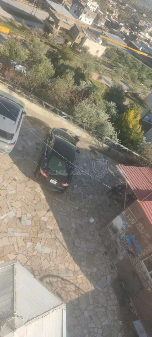أرض في قطعة أرض مع منزل طابقين بسعر مغري جدا  - 70,000 دأ - صورة 1