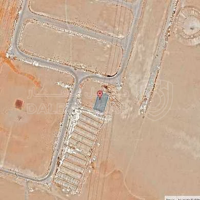 أرض في قرية الصلاحية - امتداد طريق المطار - 25,000 دأ - صورة 1