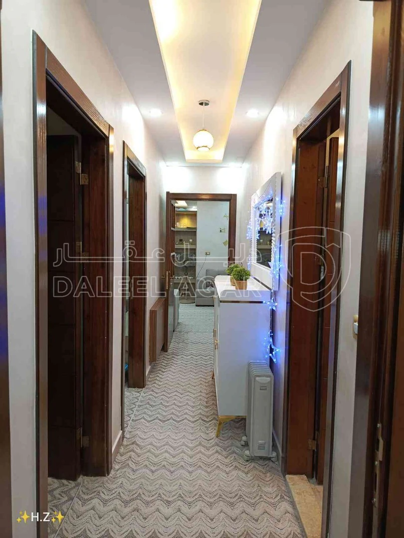 شقة في اربد شارع المعتصم 31 - 55,000 دأ - صورة 1