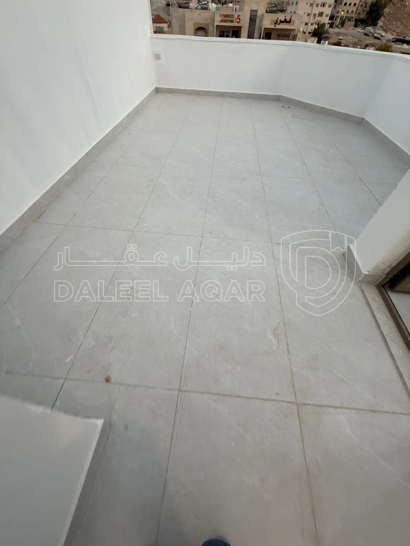 شقة في الزرقاء الجديدة - البتراوي - حي ارسلان - 59,000 دأ - صورة 1
