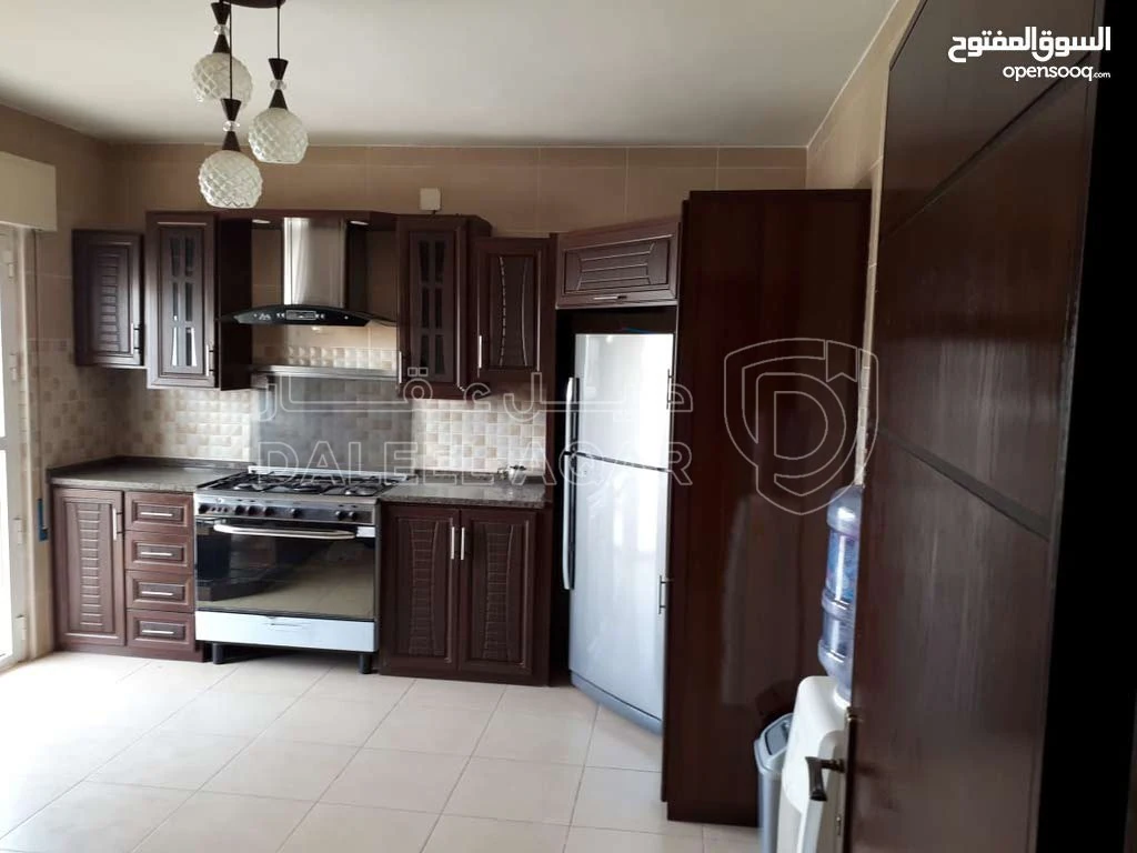 مبنى في عمارة استثمارية للبيع في اجمل مناطق الشميساني - 1,125,000 دأ - صورة 1