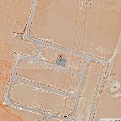 أرض في قرية الصلاحية - امتداد طريق المطار - 25,000 دأ - صورة 1