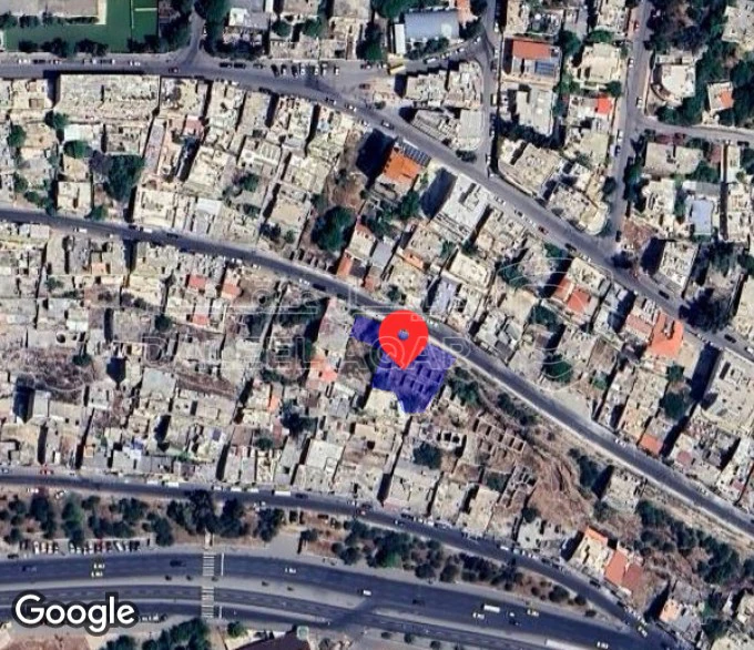 أرض في جبل عمان شارع خرفان مطلي على امانه عمان واسط البلد يوجد بها منسوب تحت الشارع واجهه الارض على الشارع 42 م تنظيم تجاري سكني ضمن سكن د - 150,000 دأ - صورة 1