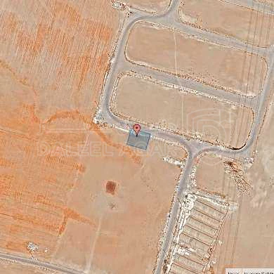 أرض في قرية الصلاحية - امتداد طريق المطار - 27,500 دأ - صورة 1