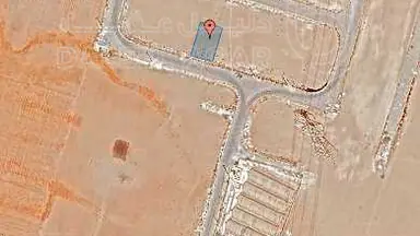 أرض في قرية الصلاحية - امتداد طريق المطار - 25,000 دأ - صورة NaN