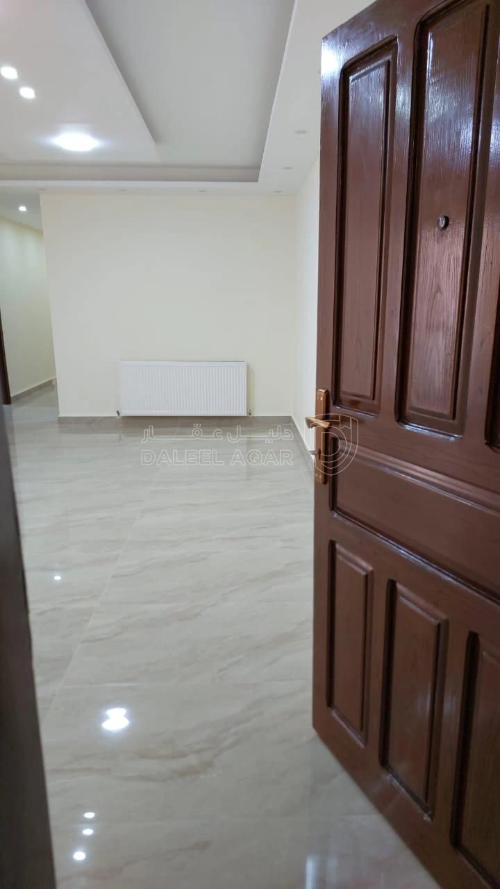 شقة في ضاحية الرشيد - خلف الجامعة الاردنية  - 53,000 دأ - صورة 1
