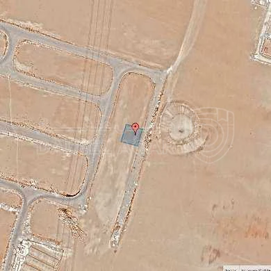 أرض في قرية الصلاحية - امتداد طريق المطار - 25,000 دأ - صورة 1
