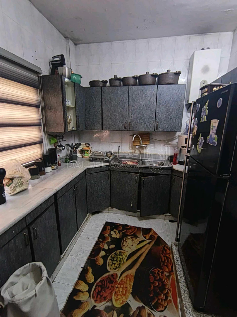 شقة في ام نواره شارع دفاع المدني - 25,000 دأ - صورة 1