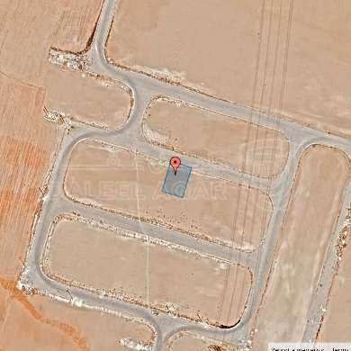 أرض في قرية الصلاحية - امتداد طريق المطار - 25,000 دأ - صورة 1