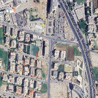 أرض في ارض تجاري حي الرونق قرب شركة الحكمة - 525,000 دأ - صورة 1