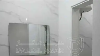 شقة - معان الإسكان خلف مؤسسة العقايلة بالقرب من مدرسة الإسكان للبنات  - 44000 دأ