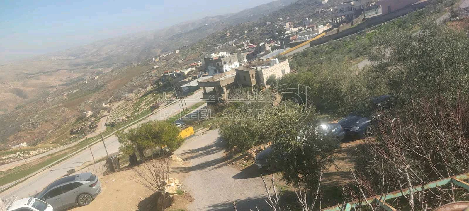 أرض في قطعة أرض مع منزل طابقين بسعر مغري جدا  - 70,000 دأ - صورة 1