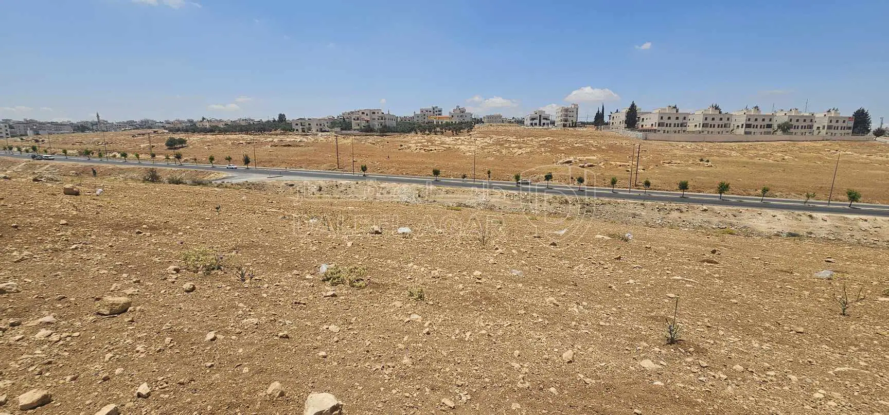 أرض في شارع شفابدران الرئيسي باتجاه عيون الذيب  - 160,000 دأ - صورة 1