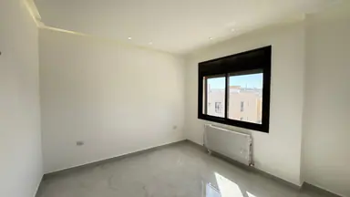 شقة في البنيات طريق المطار - 85,000 دأ - صورة NaN