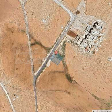 أرض في الماضونة - امام الجمرك الجديد مباشرة  - 44,000 دأ - صورة 1