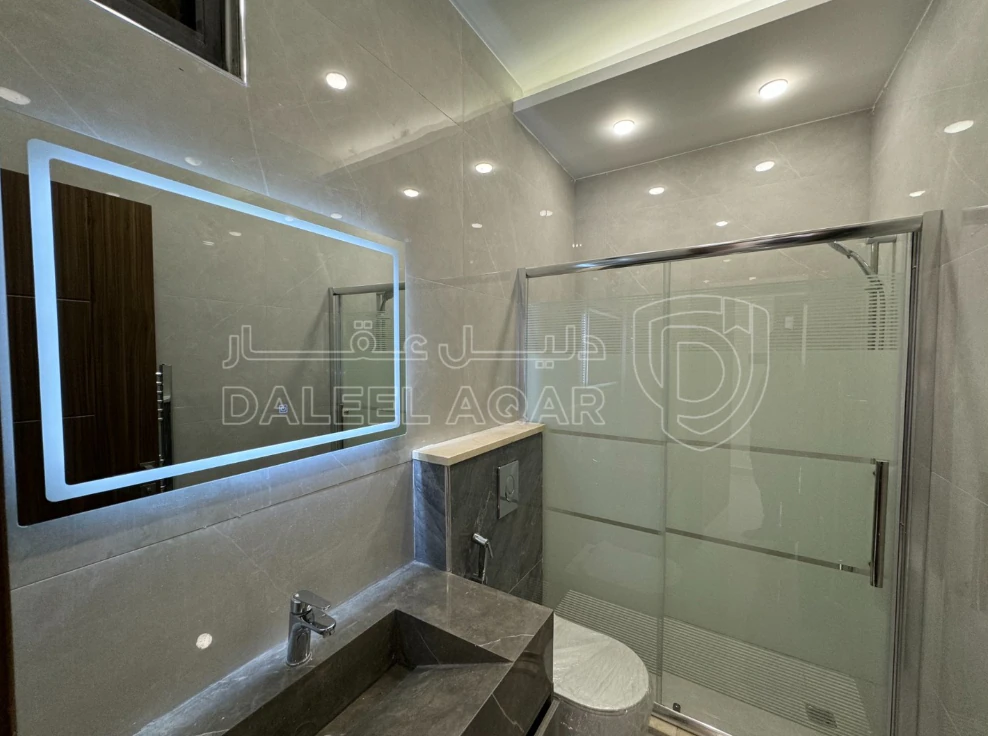 شقة في مقابل جامعة البتراء، قرب مديرية الأمن العام - 91,000 دأ - صورة 1