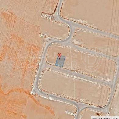 أرض في قرية الصلاحية - امتداد طريق المطار - 25,000 دأ - صورة 1