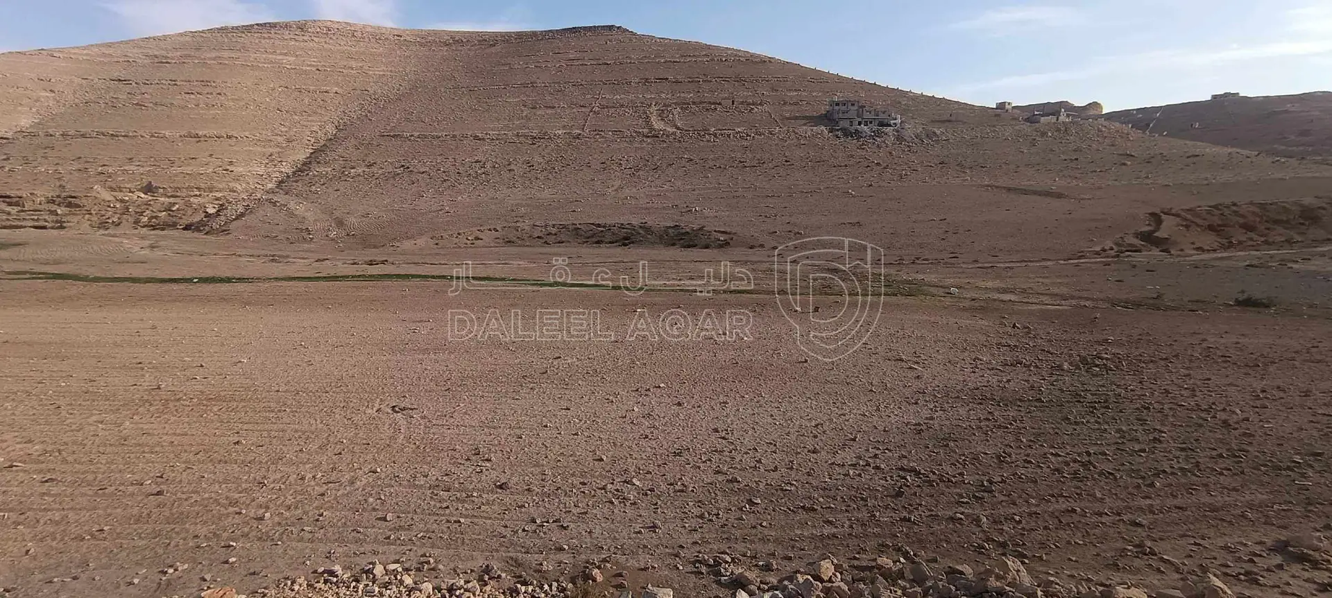 أرض في وادي القطار شاوع ال٦٠  - 125,000 دأ - صورة 1