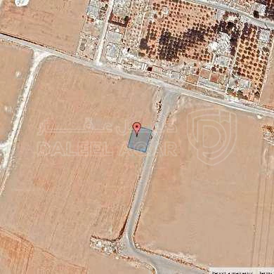 أرض في قرية الصلاحية - امتداد طريق المطار - 27,500 دأ - صورة 1
