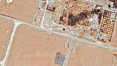 أرض في قرية الصلاحية - امتداد طريق المطار - 27,500 دأ - صورة NaN