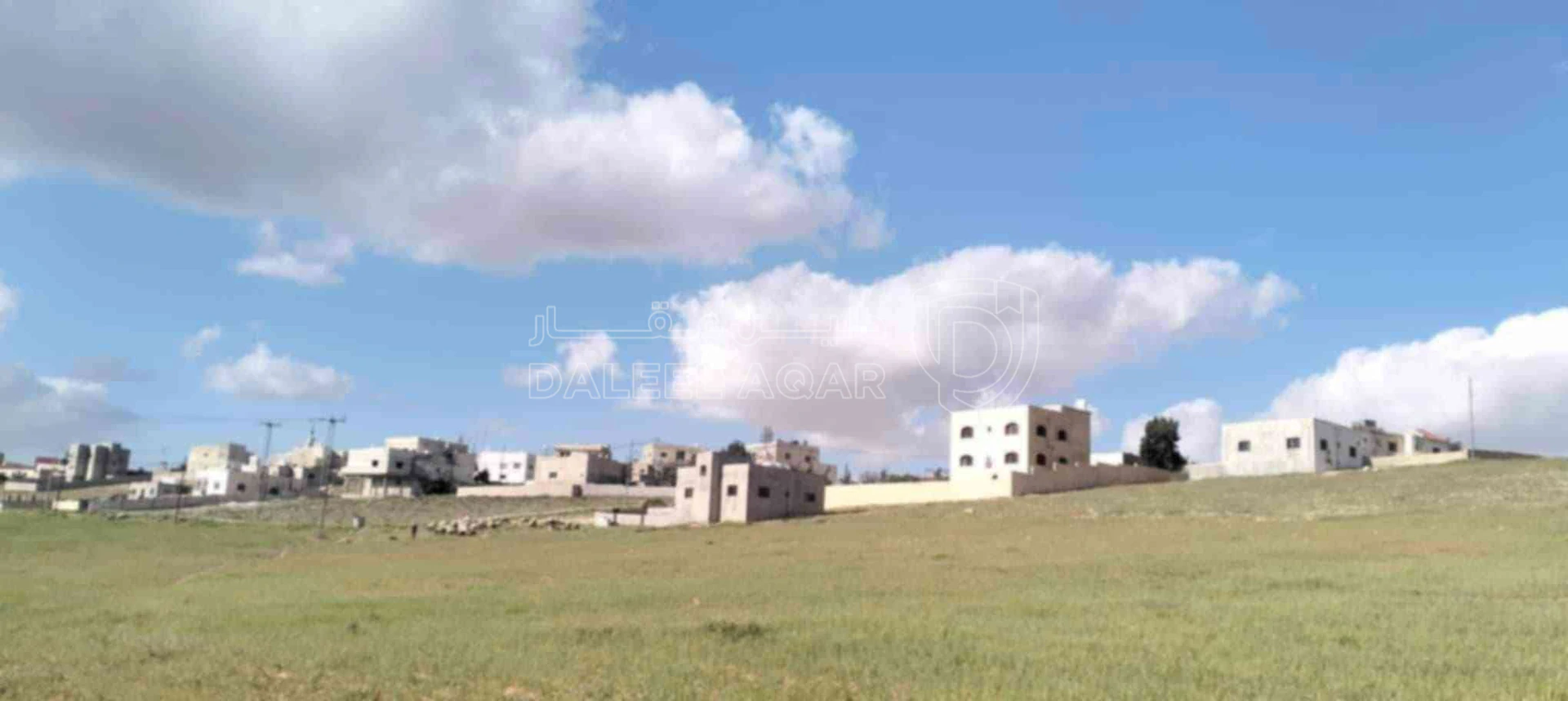أرض في مشترك محددة داخل التنظيم تحديد حكومي - 15,000 دأ - صورة 1