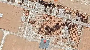 أرض في قرية الصلاحية - امتداد طريق المطار - 27,500 دأ - صورة NaN