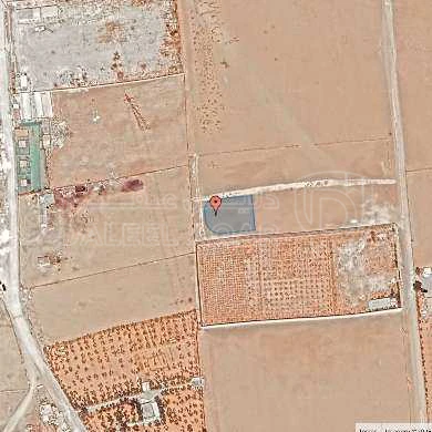 أرض في قبل جسر المطار ب 2 كم - 81,500 دأ - صورة 1