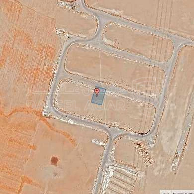 أرض في قرية الصلاحية - امتداد طريق المطار - 25,000 دأ - صورة 1