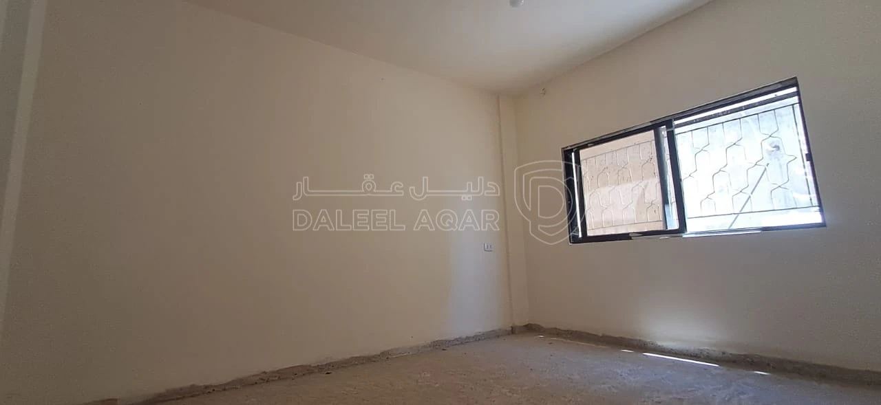 مبنى في الرصيفة - تطوير النقب - قريب اتستراد عمان الزرقاء - 55,000 دأ - صورة 1