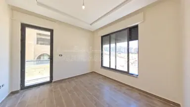 شقة في طريق المطار الحويطي خلف المدارس العالمية - 145,000 دأ - صورة NaN
