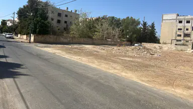 أرض في ارض تجاري حي الرونق قرب شركة الحكمة - 525,000 دأ - صورة NaN