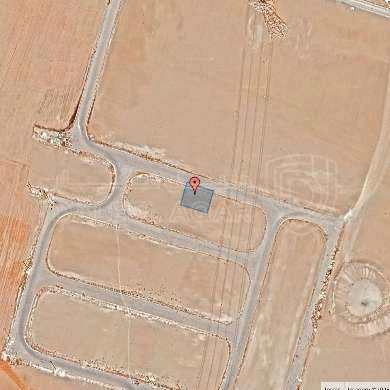 أرض في قرية الصلاحية - امتداد طريق المطار - 25,000 دأ - صورة 1