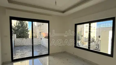 شقة في في ضاحية الياسمين تشطيب حديث طابق اول  - 57,000 دأ - صورة NaN