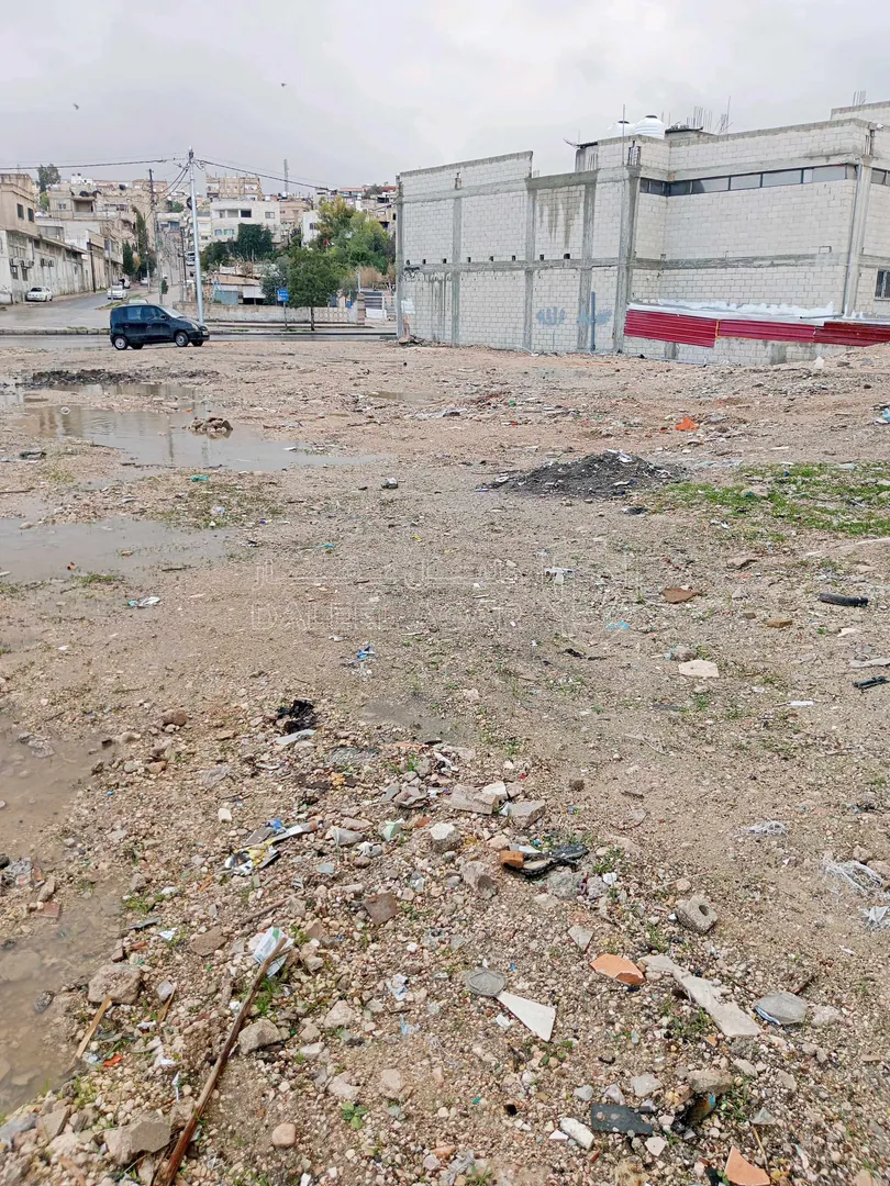 أرض في الزرقاء جسر الجبل الابيض - 130,000 دأ - صورة 1