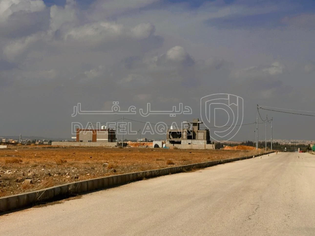 أرض في القسطل حوض 8 داخل كمباوند روابي المطار  - 55,000 دأ - صورة 1