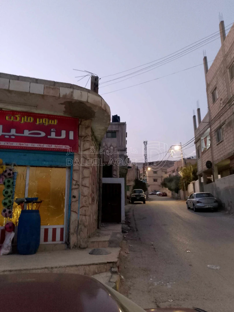 مبنى في الزرقاء حي معصوم مثلث الجبل الاول  - 110,000 دأ - صورة 1