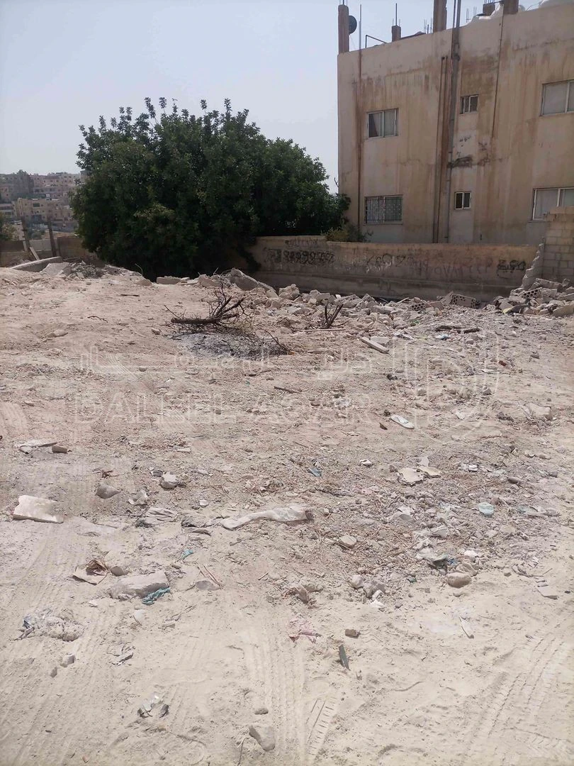 أرض في حي النصر،بالقرب من مسجد الفلاح - 25,000 دأ - صورة 1