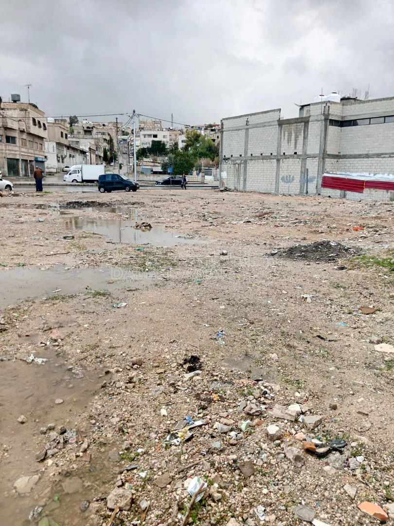 أرض في الزرقاء جسر الجبل الابيض - 130,000 دأ - صورة 1
