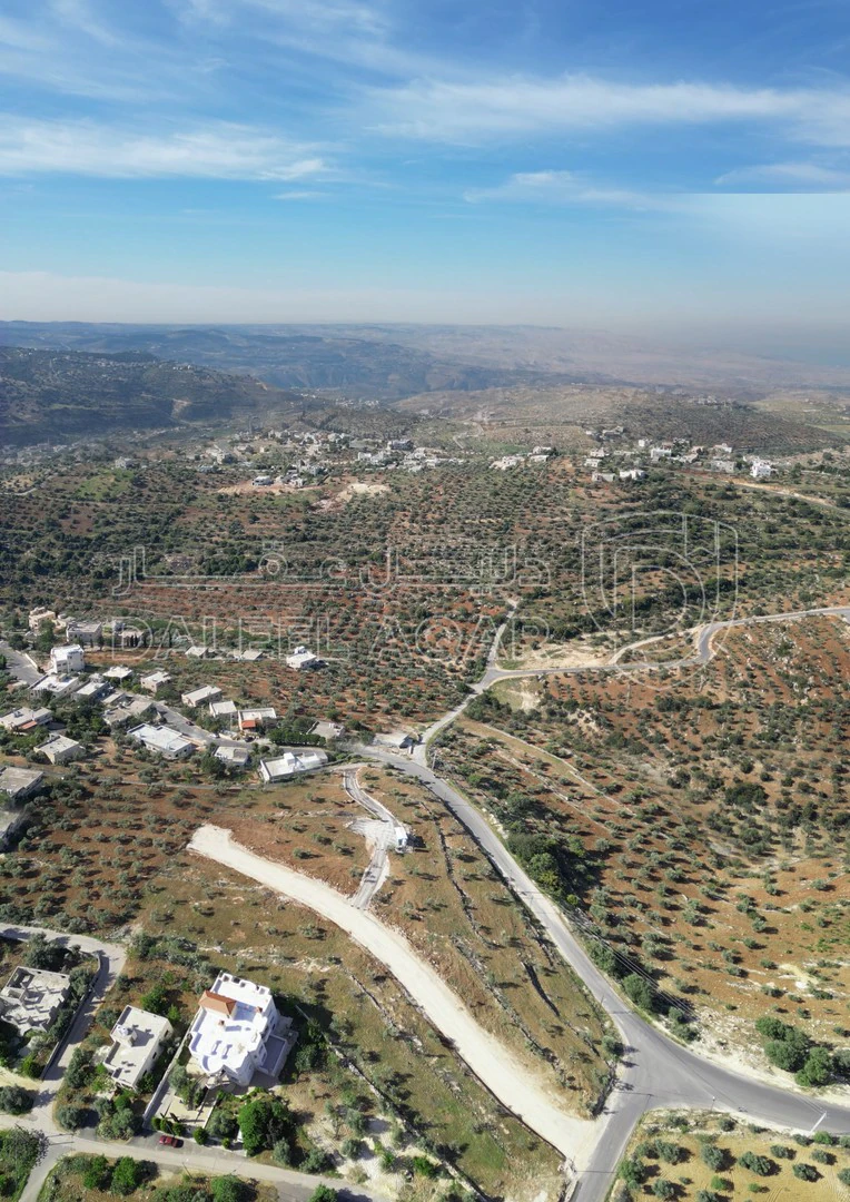 أرض في أرض سكنية للبيع في بدر الجديدة - منطقة بلال - 165,000 دأ - صورة 1