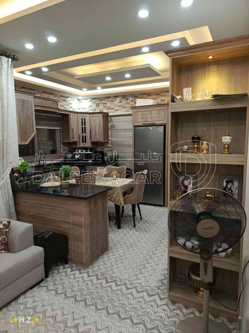 شقة في اربد شارع المعتصم 31 - 55,000 دأ - صورة 1