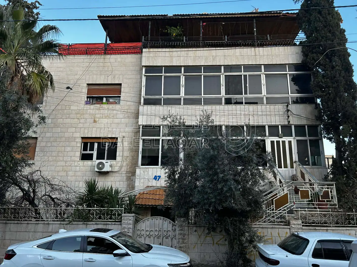 مبنى في شارع منصور السرحان  - 200,000 دأ - صورة 1