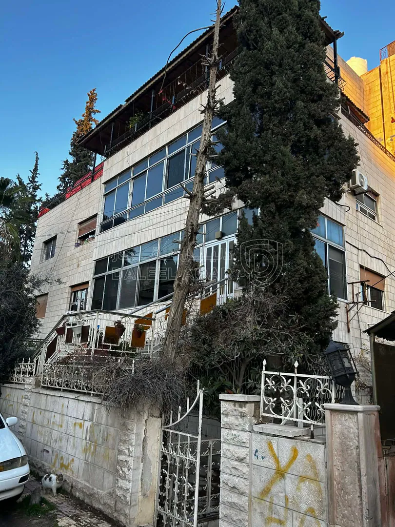 مبنى في شارع منصور السرحان  - 200,000 دأ - صورة 1