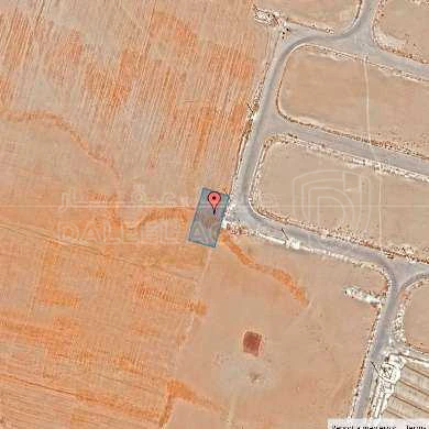 أرض في قرية الصلاحية - امتداد طريق المطار - 27,500 دأ - صورة 1