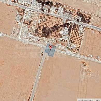 أرض في قرية الصلاحية - امتداد طريق المطار - 27,500 دأ - صورة 1